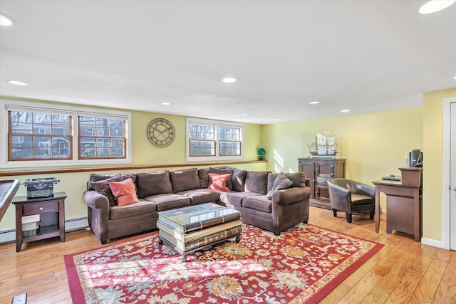 living room featuring light hardwood / wood-style flooring and a baseboard radiator