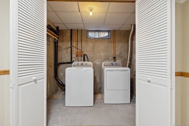 laundry area with carpet floors and washer and dryer