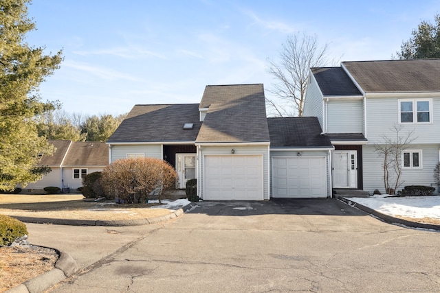 front facade with a garage