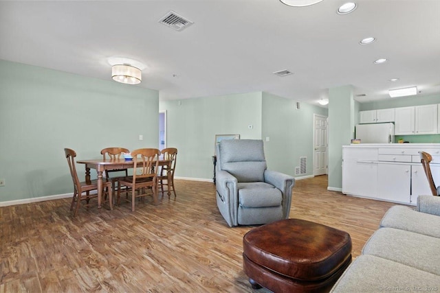 living room with light wood-type flooring