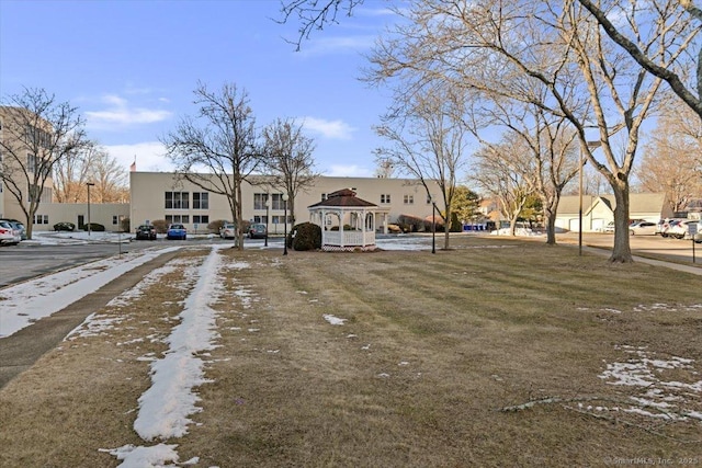 view of front of property featuring a gazebo