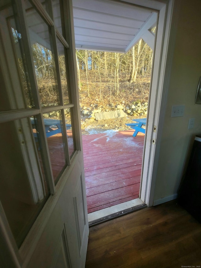 entryway with wood finished floors