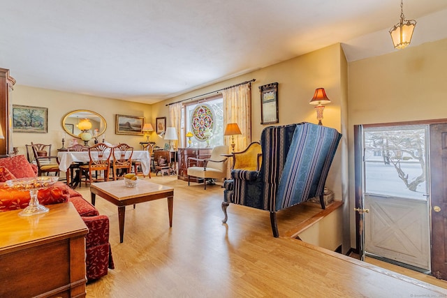 living room with light hardwood / wood-style floors