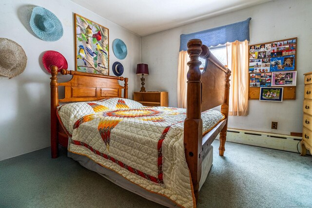 carpeted bedroom featuring baseboard heating