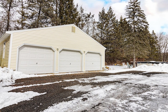 view of snow covered garage