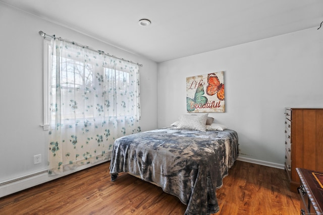 bedroom featuring dark hardwood / wood-style floors