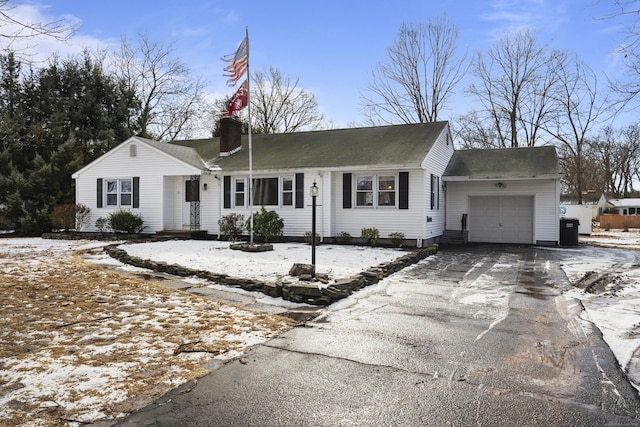 single story home with a garage