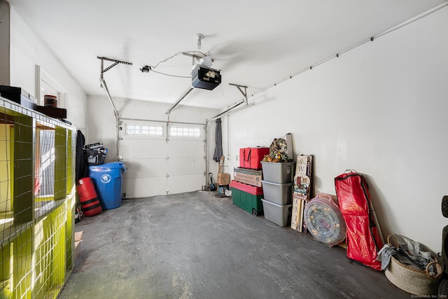 garage featuring a garage door opener