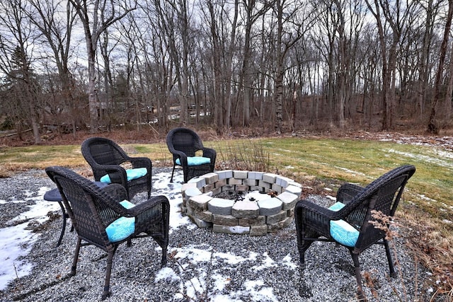 view of patio / terrace featuring an outdoor fire pit