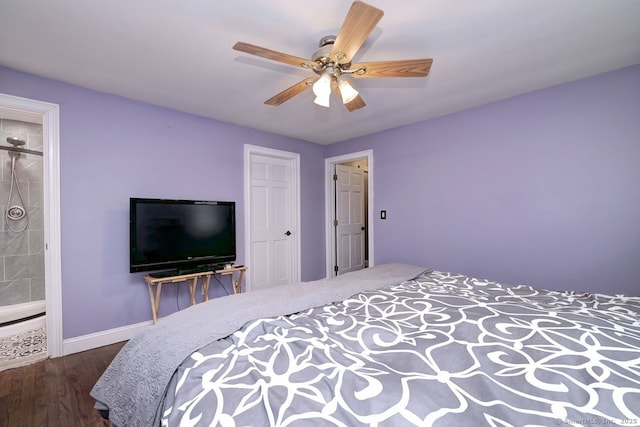 bedroom featuring dark hardwood / wood-style flooring, connected bathroom, and ceiling fan