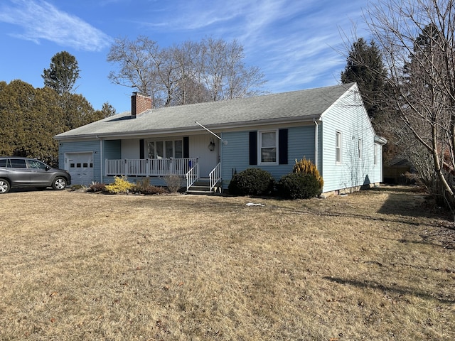 ranch-style home featuring a porch, a garage, and a front lawn