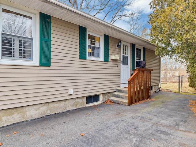 exterior space featuring a gate and fence