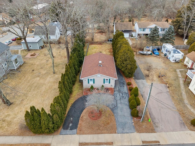 birds eye view of property with a residential view