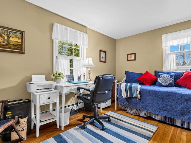 bedroom with wood finished floors