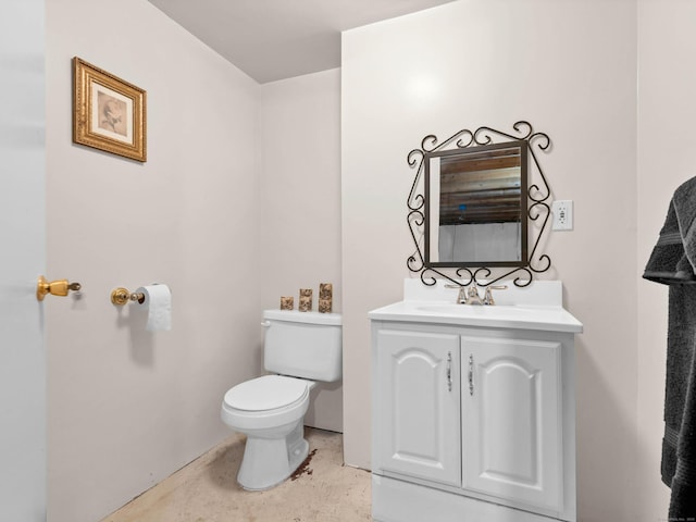 half bath featuring vanity, toilet, and concrete floors