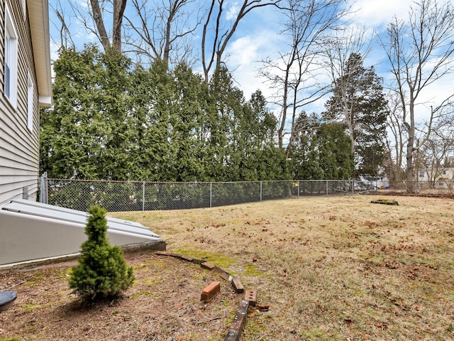 view of yard featuring a fenced backyard