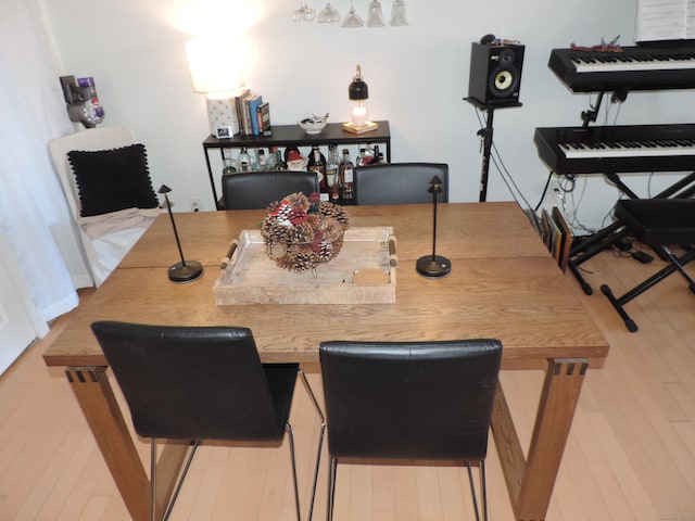 dining area featuring hardwood / wood-style floors