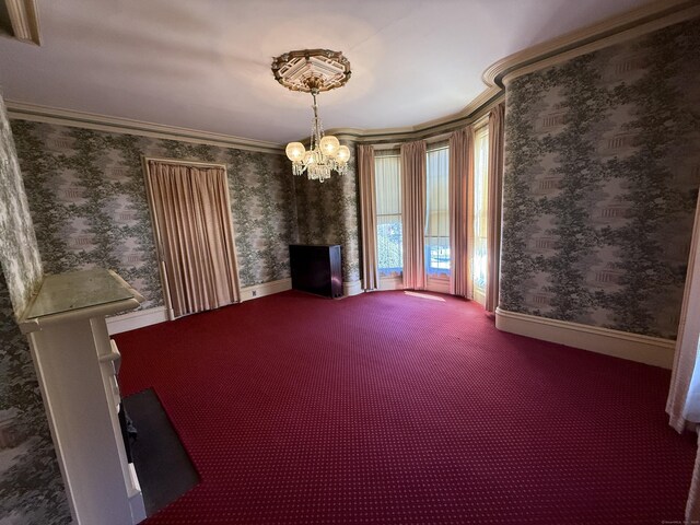 55 Walnut St, Winchester, CT 06098 - interior space featuring ornamental molding, carpet, and a notable chandelier