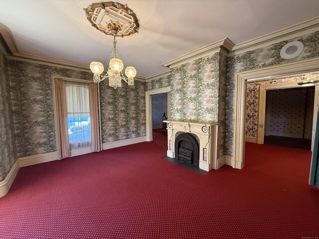 55 Walnut St, Winchester, CT 06098 - unfurnished living room featuring dark colored carpet, ornamental molding, and an inviting chandelier