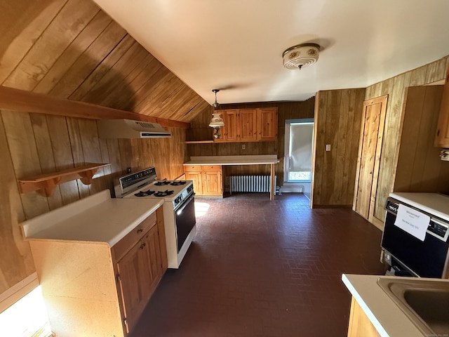 55 Walnut St, Winchester, CT 06098 - kitchen with pendant lighting, radiator, white gas range oven, and wood walls