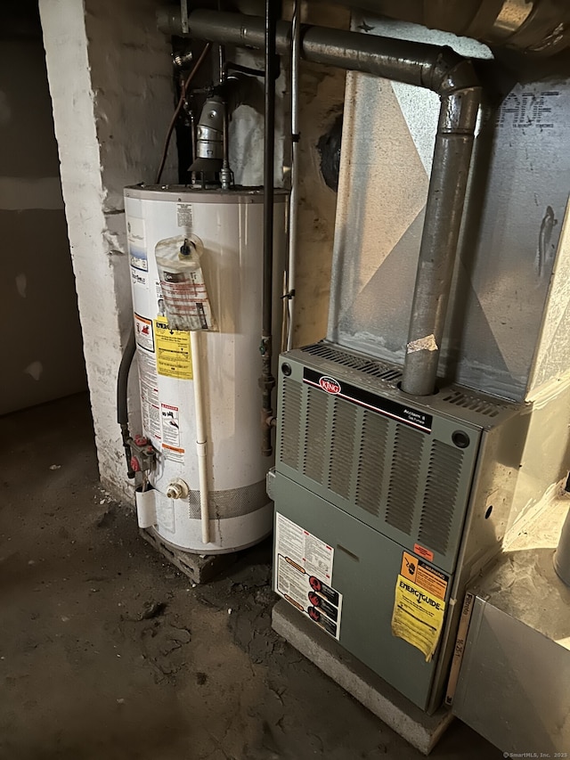 utility room with gas water heater