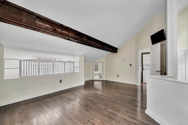 unfurnished living room with baseboards, lofted ceiling with beams, and dark wood-type flooring