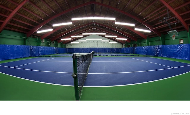 view of tennis court featuring community basketball court