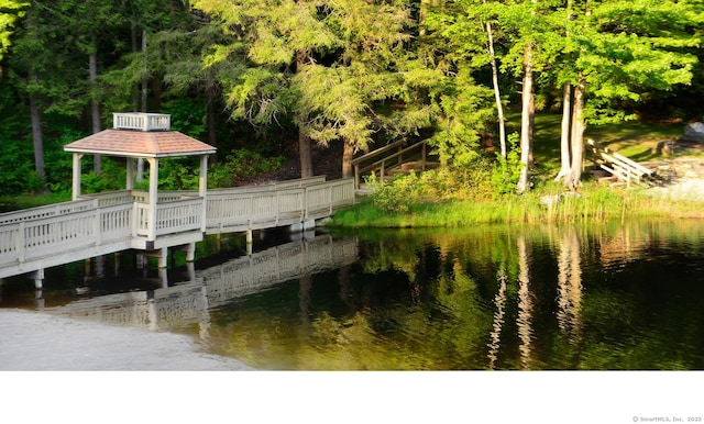 dock area featuring a water view and a gazebo