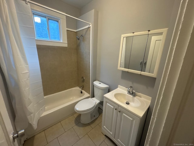 full bathroom featuring vanity, shower / bath combo, tile patterned floors, and toilet