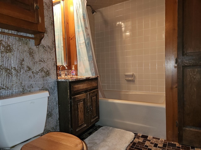 full bathroom with vanity, toilet, and shower / bath combo