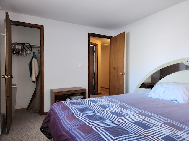 carpeted bedroom with a closet