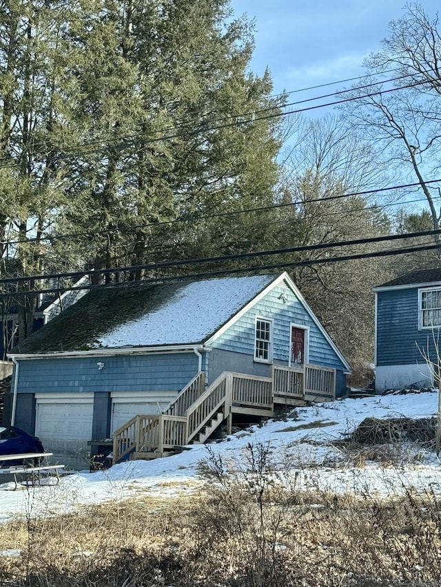 view of front of home with an outbuilding