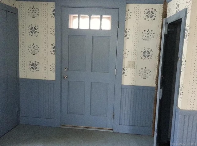 entryway featuring wainscoting