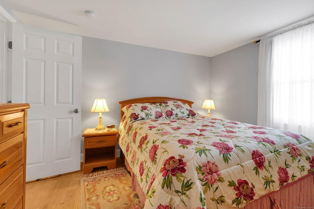 bedroom featuring light wood-type flooring