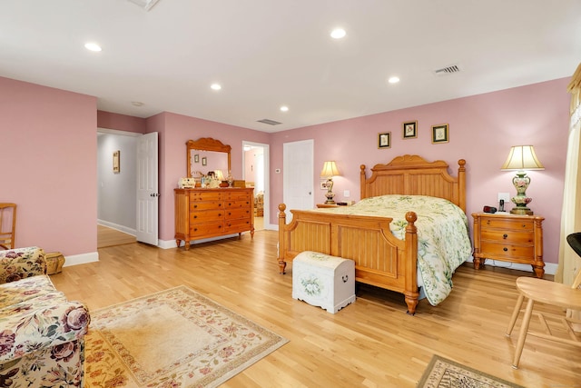 bedroom featuring light wood-type flooring