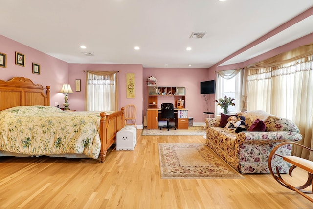 bedroom featuring light wood-type flooring