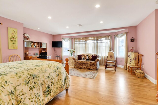 bedroom with light wood-type flooring