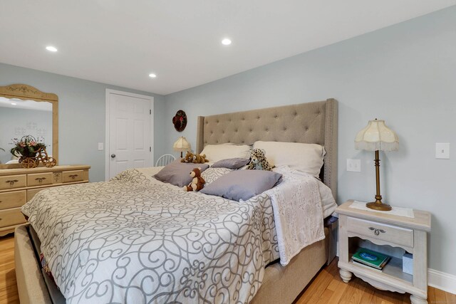 bedroom featuring light wood-type flooring