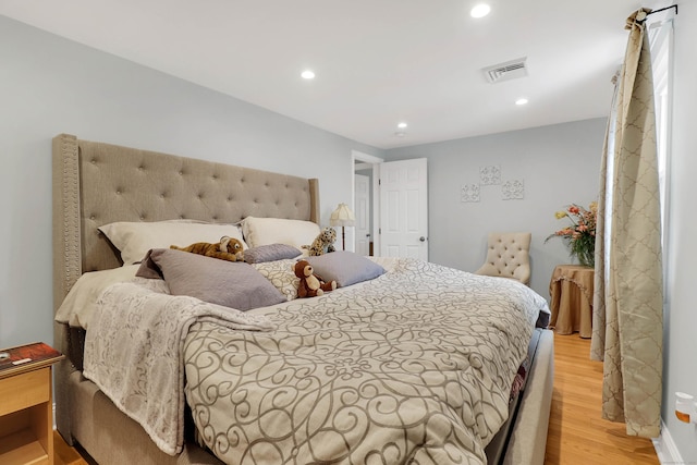 bedroom featuring light hardwood / wood-style flooring