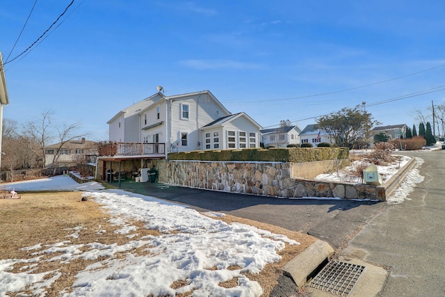 view of front of house featuring a wooden deck