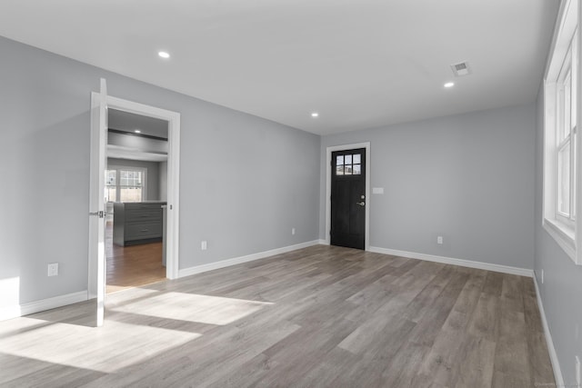 empty room featuring light hardwood / wood-style floors