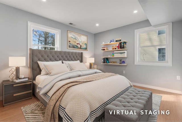 bedroom featuring light hardwood / wood-style flooring