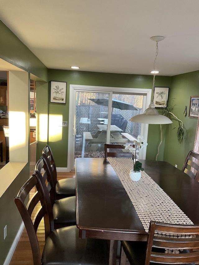 dining area featuring hardwood / wood-style flooring