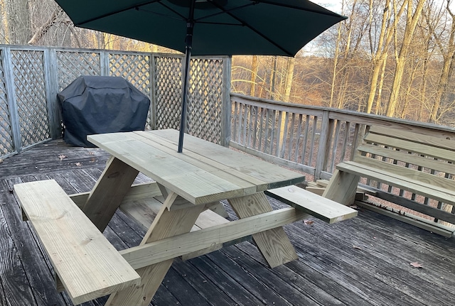 wooden terrace with grilling area