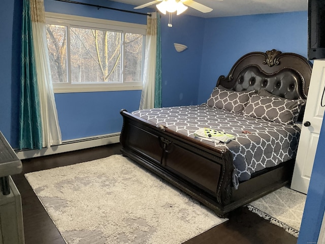 bedroom featuring a baseboard radiator and ceiling fan