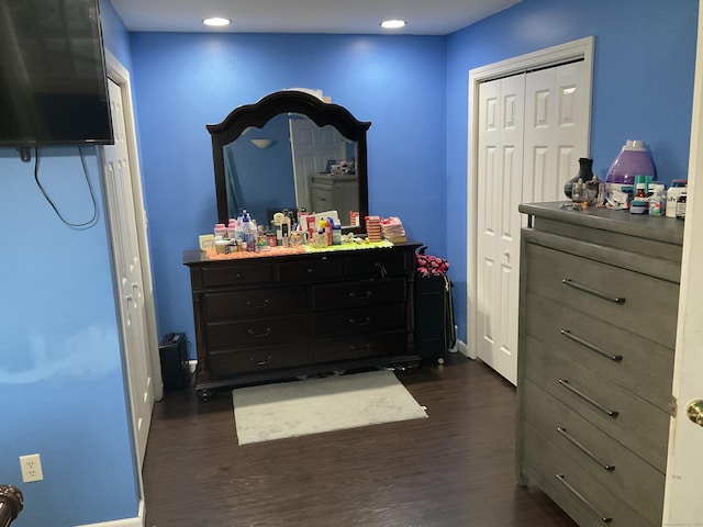 bedroom featuring dark hardwood / wood-style flooring