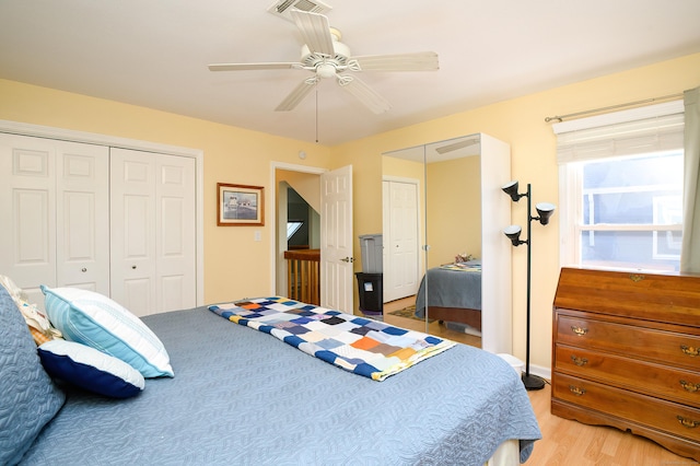 bedroom featuring hardwood / wood-style flooring and ceiling fan