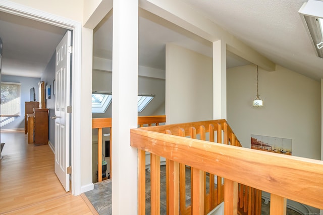 hall with light hardwood / wood-style floors