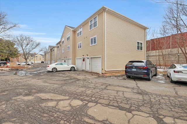 exterior space with a garage