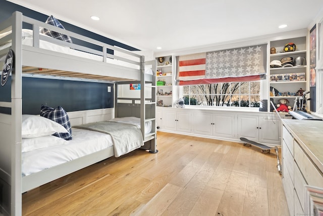 bedroom with light wood-type flooring